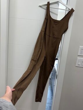 Brown body suit